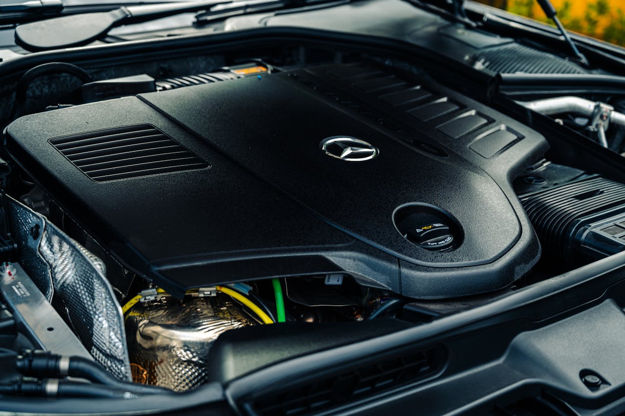 services-02 Detailed view of a Mercedes-Benz engine showcasing high-performance luxury technology.